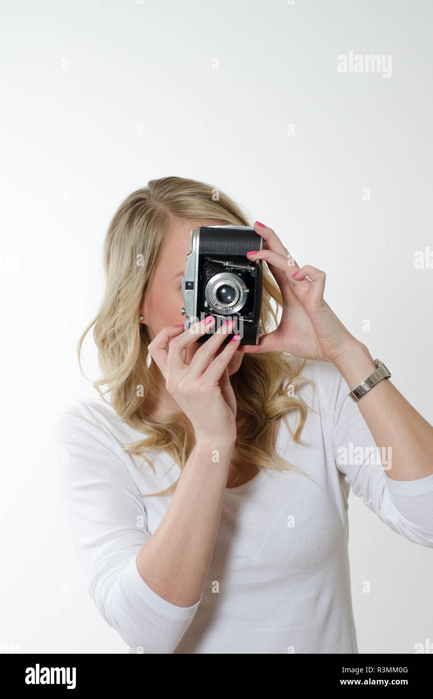 Femme avec caméra historique Banque D'Images