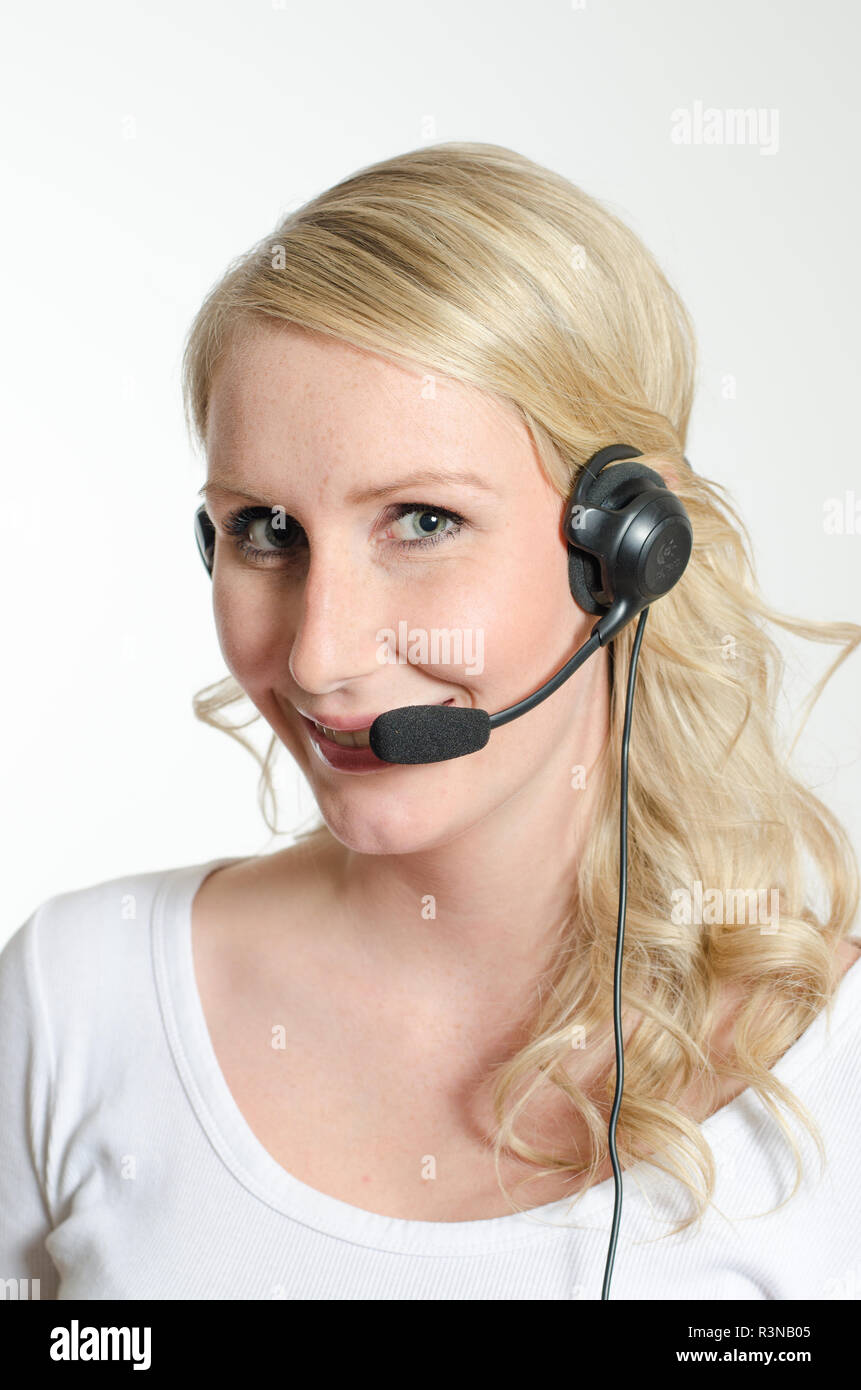 Jeune femme avec casque Banque D'Images