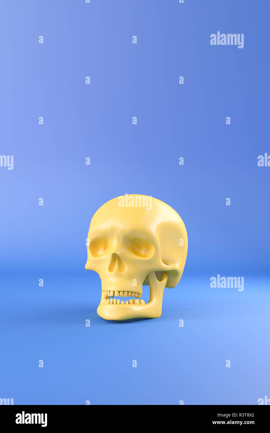 Le Rendu 3D, crâne jaune contre fond bleu Banque D'Images