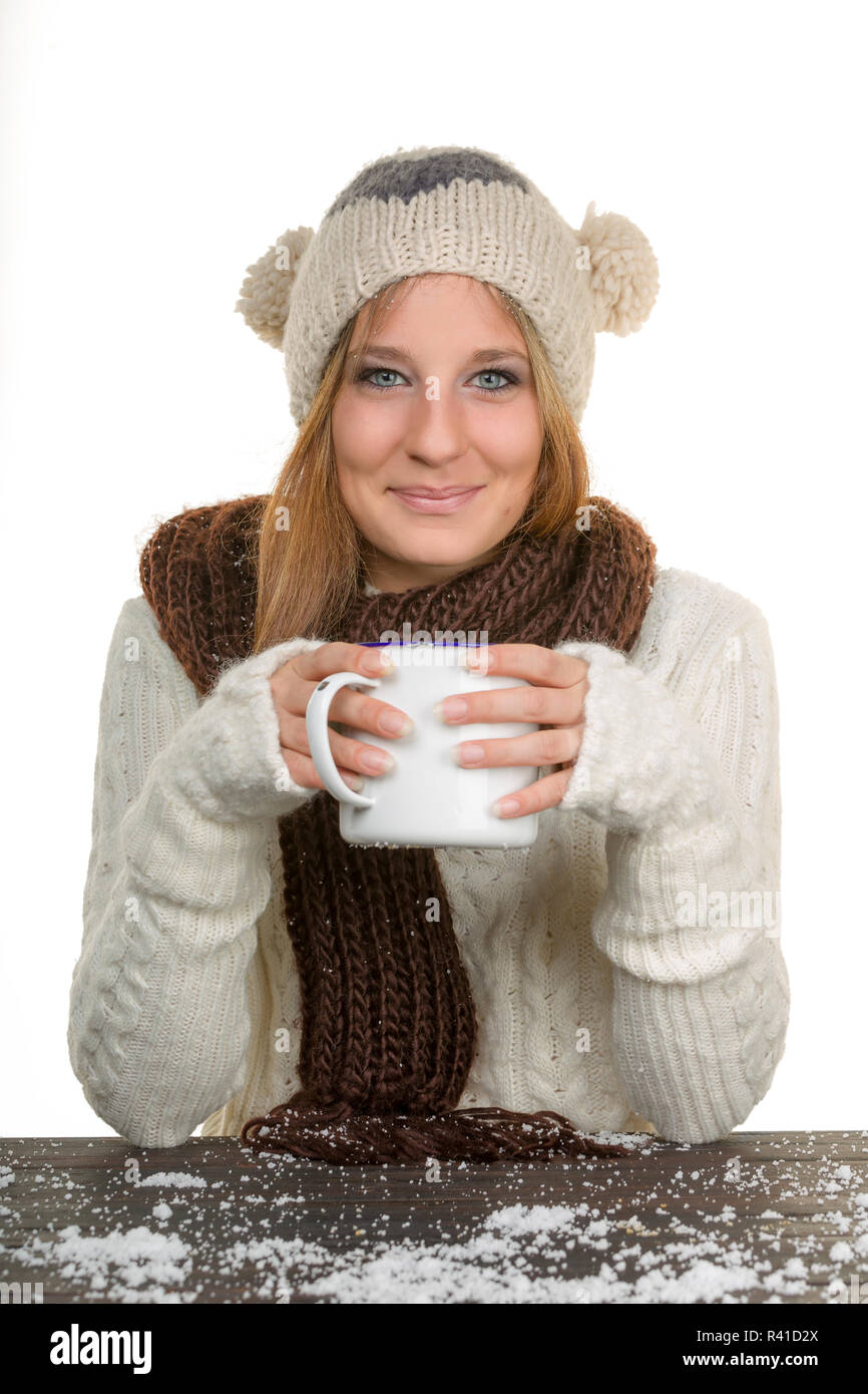 Jeune femme avec coupe du blanc dans la main Banque D'Images