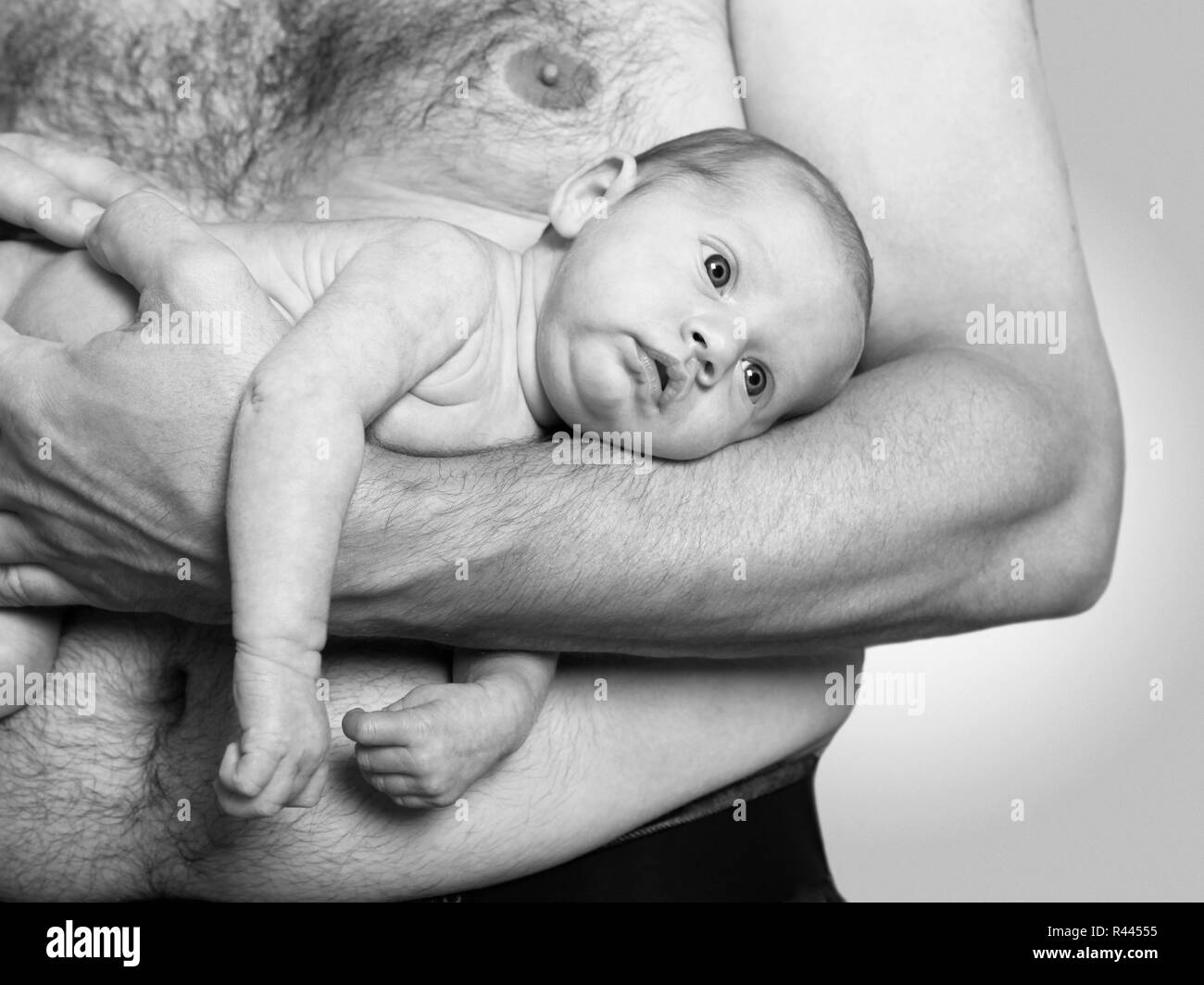 Père holding baby Banque D'Images
