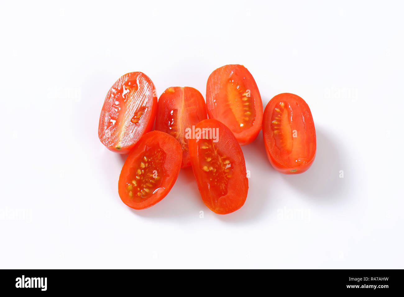 Tomates italiennes, coupées en deux Banque D'Images