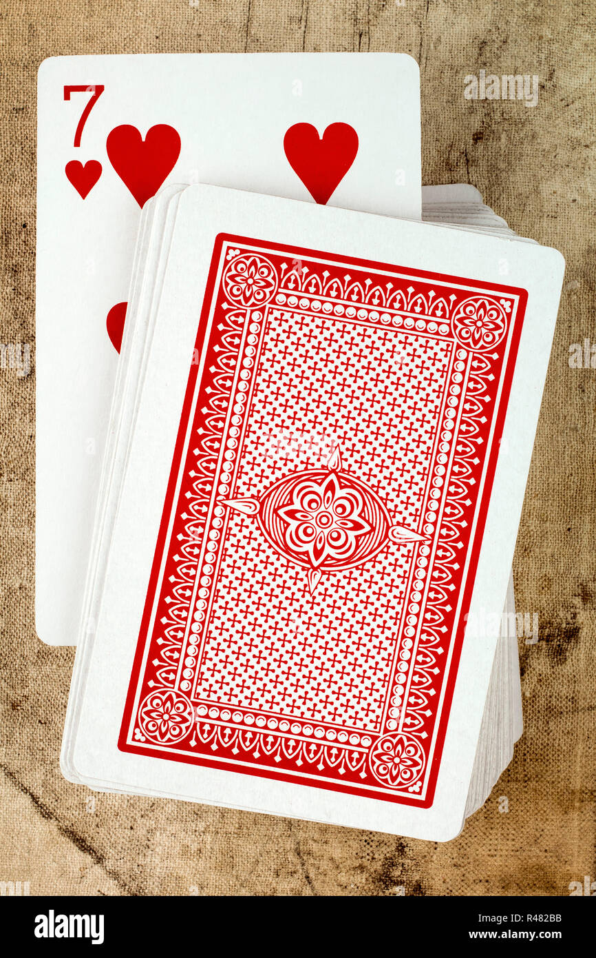 Jeu de cartes avec sept des coeurs Banque D'Images