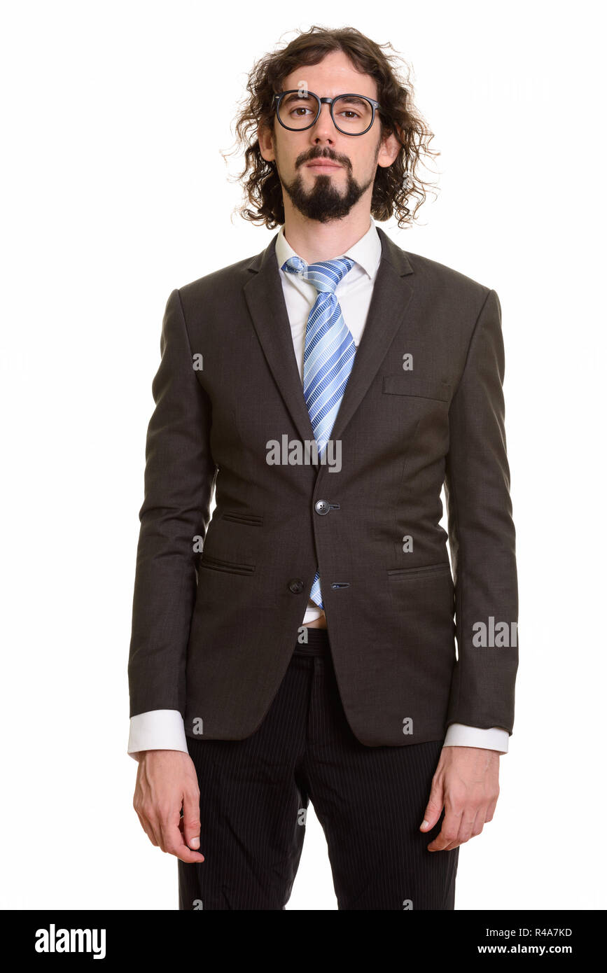 Portrait of handsome Caucasian businessman standing Banque D'Images