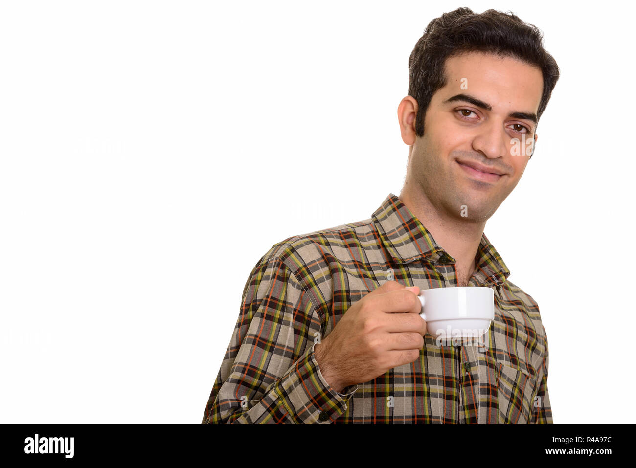 Portrait de jeune homme persan holding Coffee cup Banque D'Images