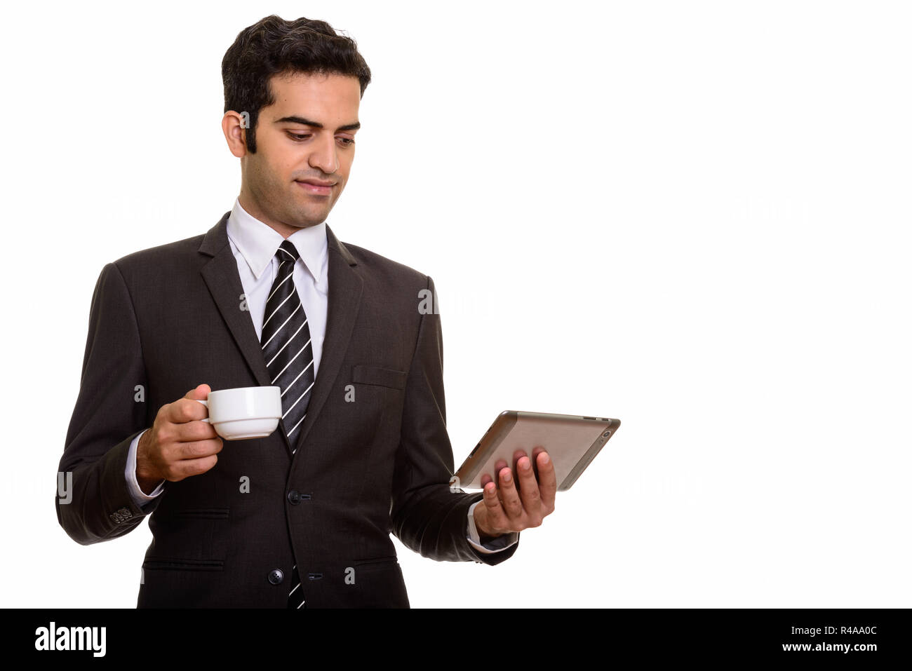 Young Woman holding digital tablet perse et Coffee cup Banque D'Images