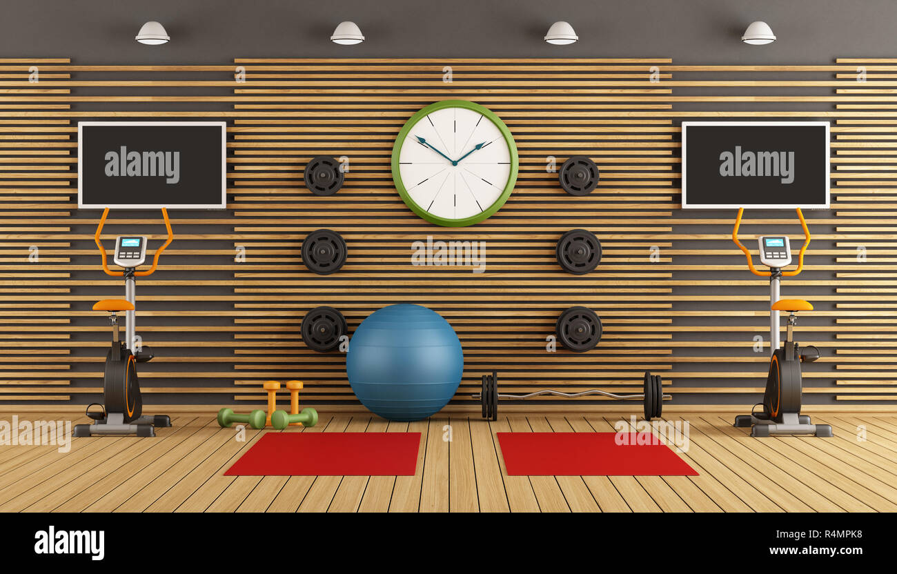Chambre en bois avec salle de sport matériel Banque D'Images