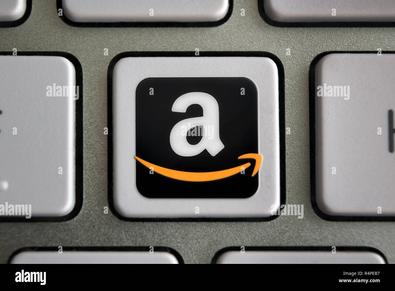 Logo Amazon icône sur la touche du clavier de l'ordinateur, illustration du  bouton Photo Stock - Alamy