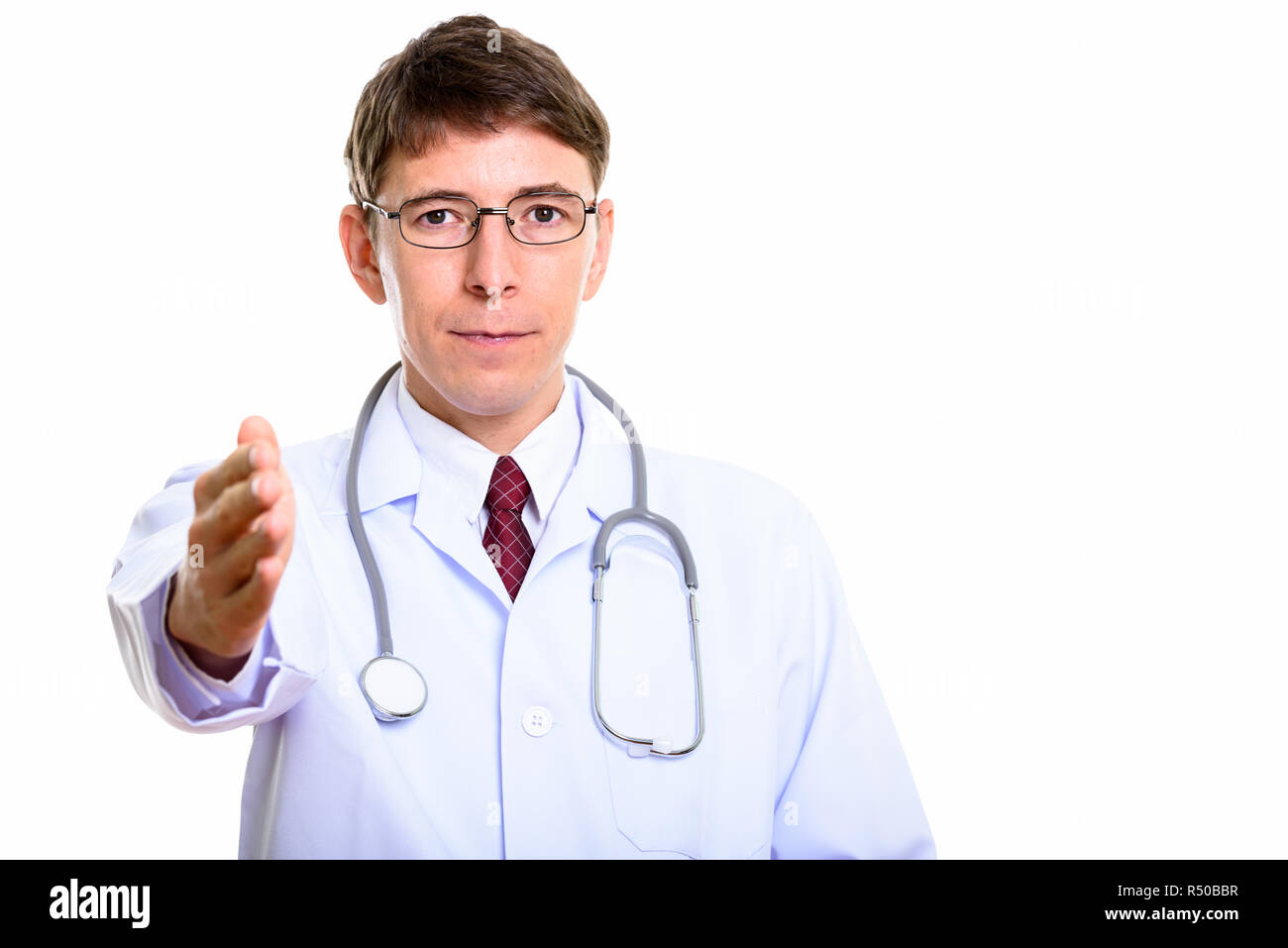 Portrait de l'homme médecin donnant handshake Banque D'Images