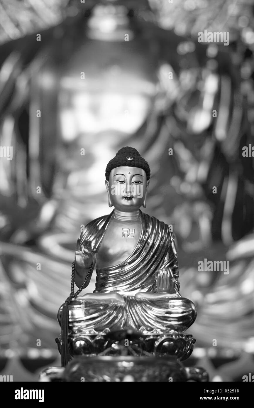 La Chine Bouddha Doré cheveux bleu noir blanc Banque D'Images
