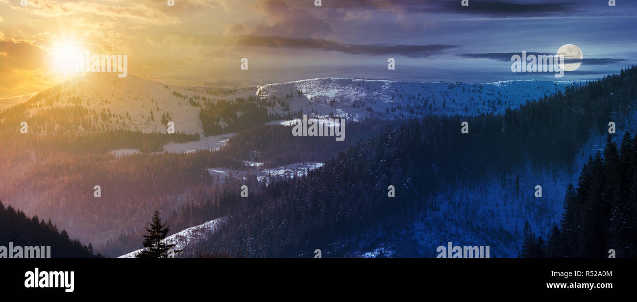 Changement de temps avec soleil et lune au-dessus de la crête de montagne panorama charmant paysage d'hiver. Banque D'Images