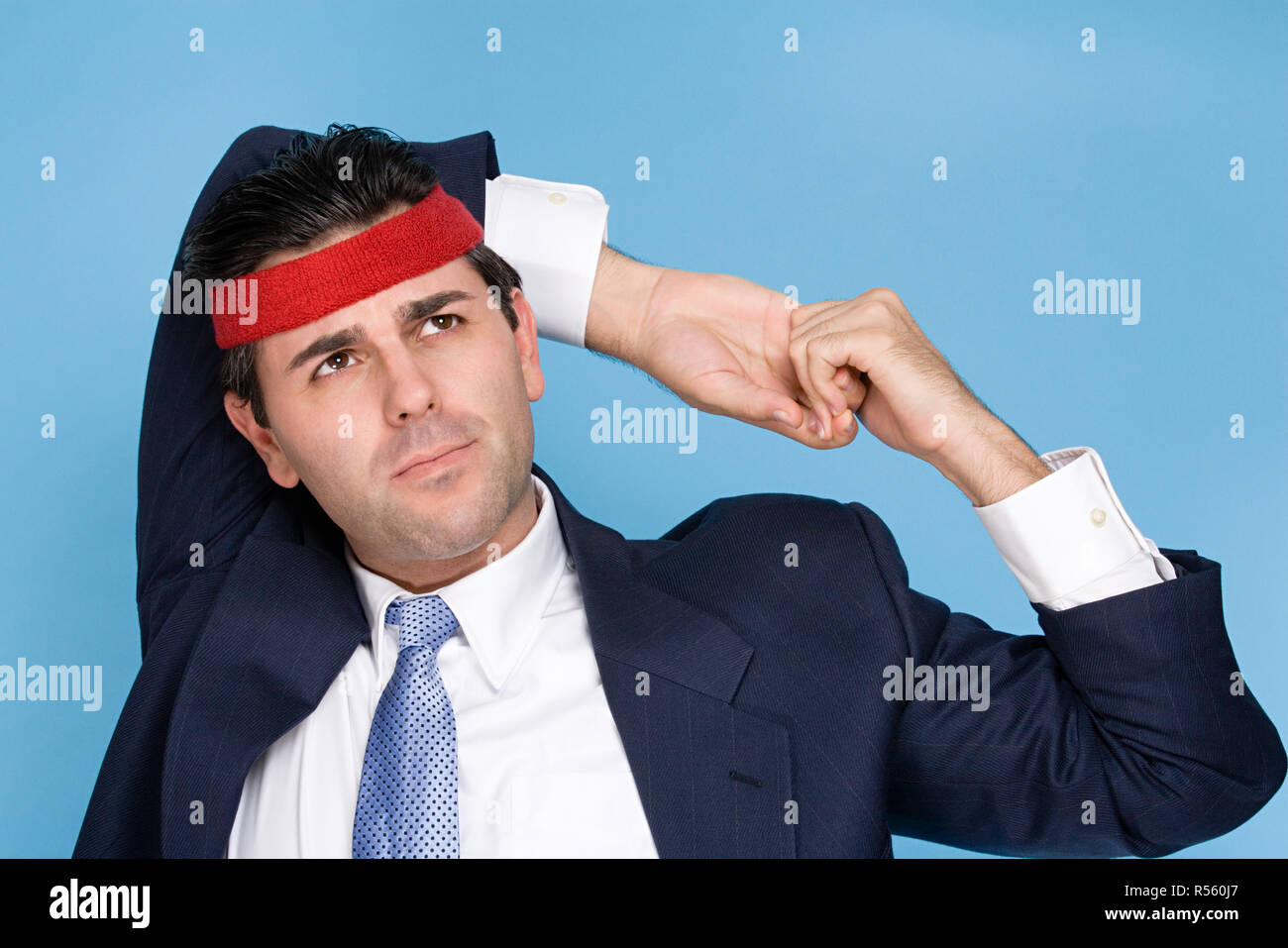 Businessman wearing a sweatband Banque D'Images