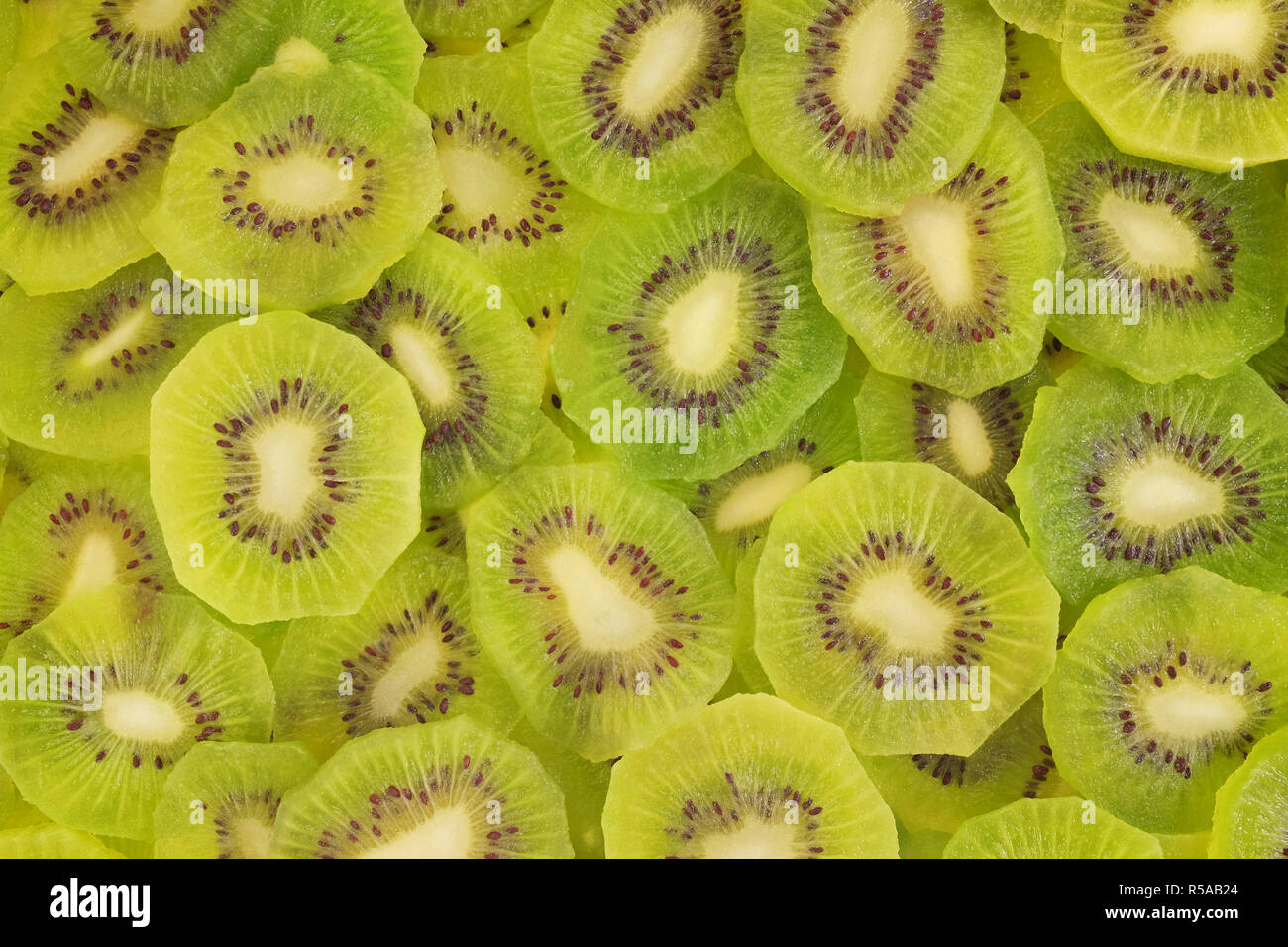 Tranches de kiwi frais comme un abrégé texture background Banque D'Images