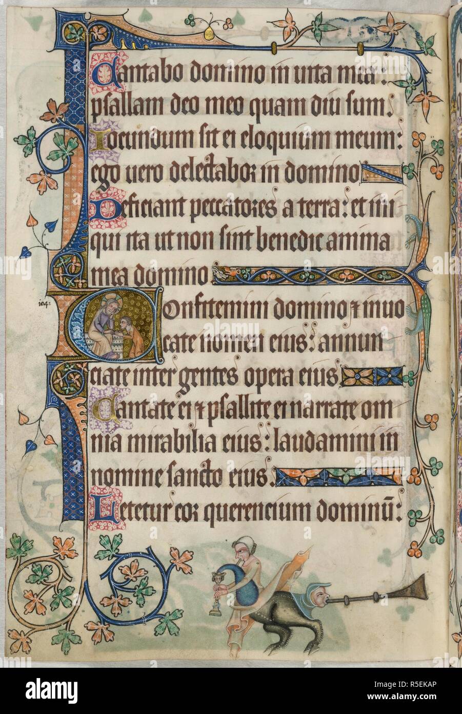 Psaume 104 ; grotesque. Luttrell Psalter. L'Angleterre [East Anglia] ; années 1325-1335. [Folio] fin du psaume 103. Psaume 104 en commençant par 'C' initial, le Christ assis, entendant les confessions d'un homme agenouillé. Décoration de la frontière, y compris dans la marge inférieure, d'un grotesque avec deux têtes, l'un jouant la cornemuse, avec une tête du roi, l'autre soufflant une trompette Image prise de Luttrell Psalter. Publié à l'origine/produit en Angleterre [East Anglia] ; années 1325-1335. . Source : ajouter. 42130, f.185v. Langue : le latin. Banque D'Images