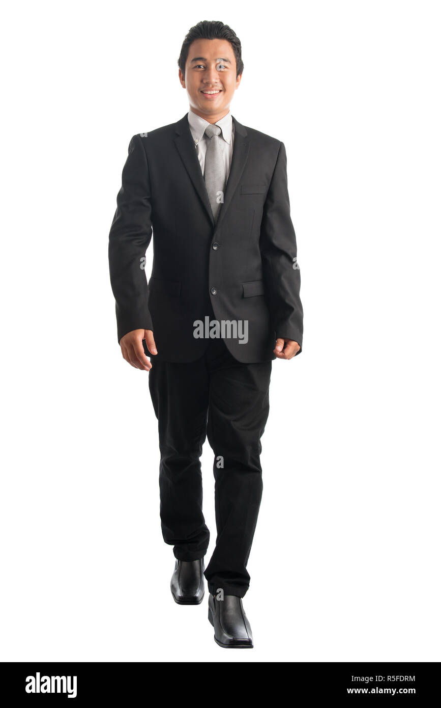 Asian business man walking Banque D'Images