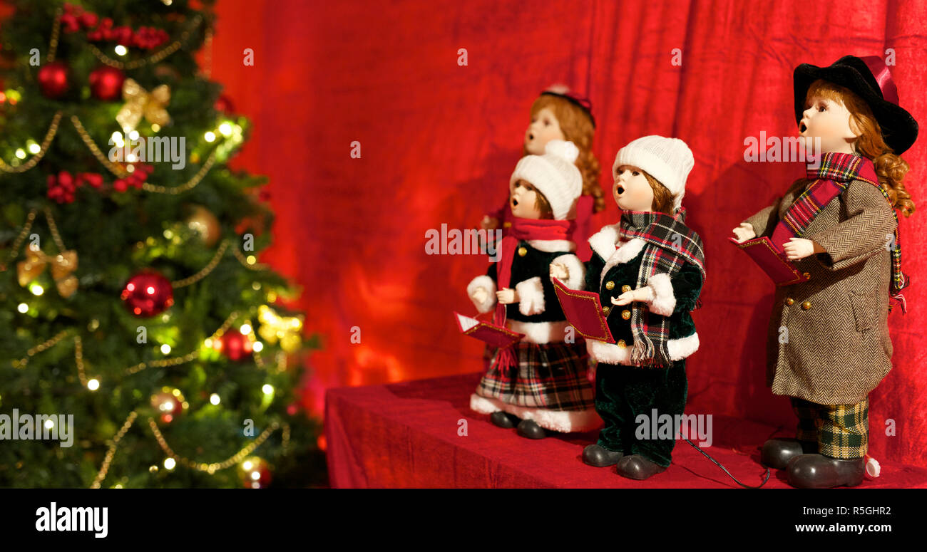 Des chansons de Noël sous l'arbre Banque D'Images