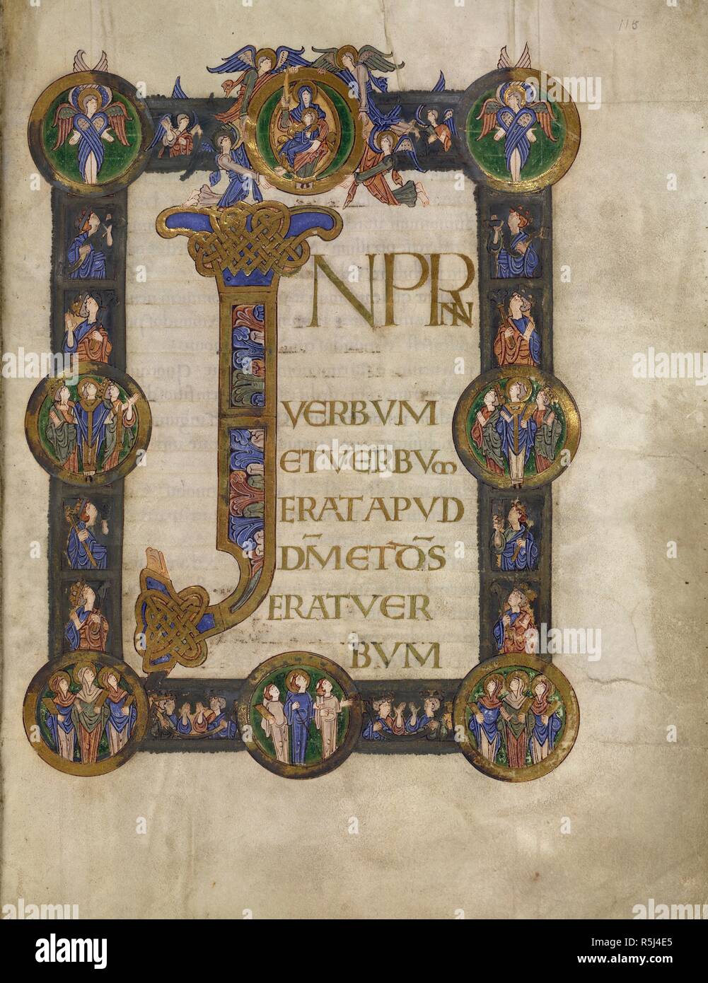 Incipit page de l'Evangile de saint Jean. Grimbald Évangiles. [Canterbury Christ Church] ; entre 1010 et 1020. [Ensemble] folio page Incipit de St l' Evangile de Jean.Text avec 'I' initial, avec décoration d'acanthe. Frontières composé de panneaux avec chiffres de mi-longueur, et cocardes contenant des choeurs de vierges et d'adoration des saints. Bord supérieur ; centre cocarde entoure intronisé vierge à l'enfant soutenu par des anges ; corner cocardes avec séraphins Grimbald Image réalisée à partir d'Évangiles. Publié à l'origine/produit dans Canterbury Christ Church [1010] ; entre et 1020. . Source : ajouter. 34890, f.115. Langue : Latin avec Banque D'Images