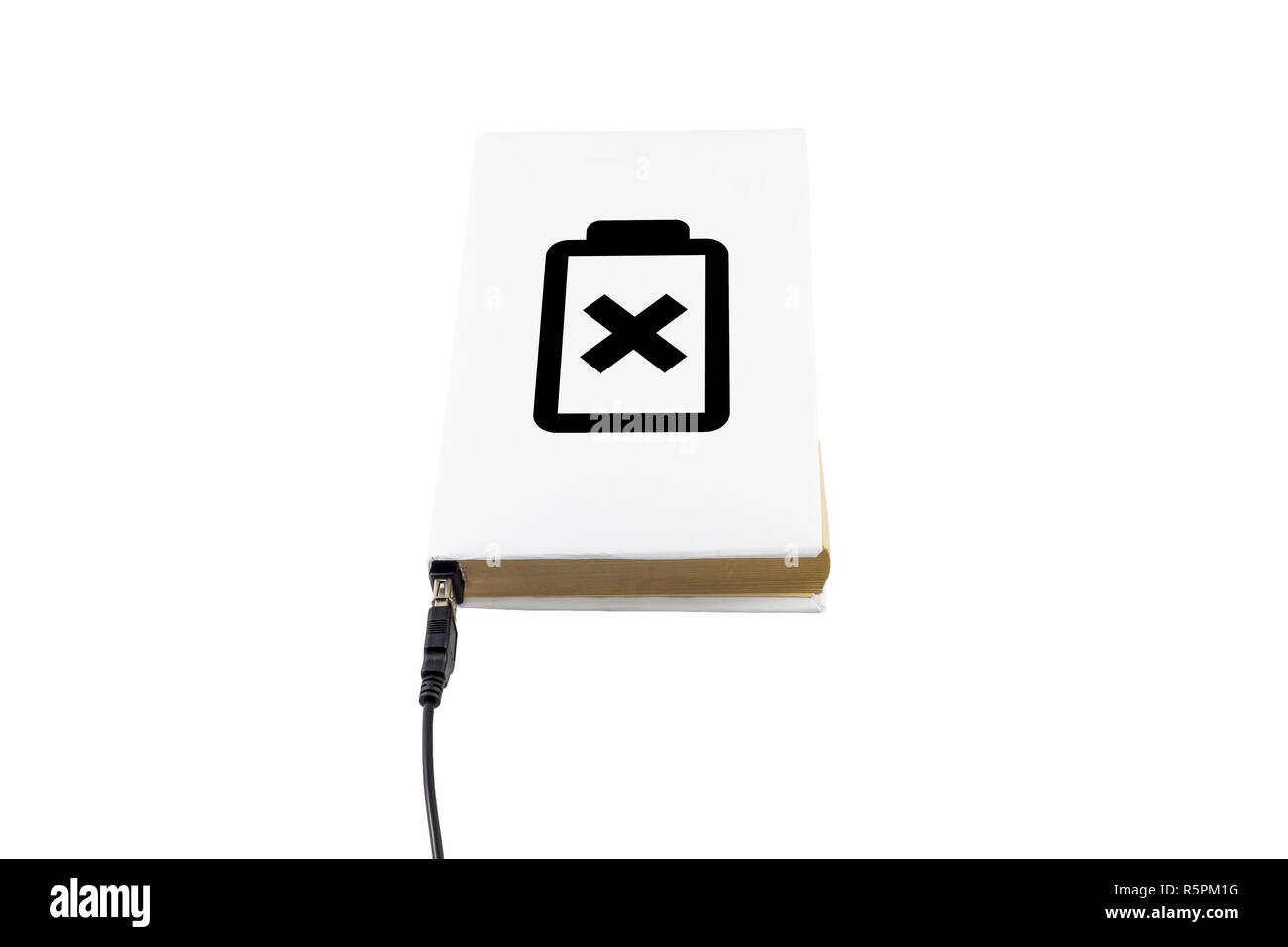 Livre avec le symbole de la batterie connectée à un câble USB Banque D'Images