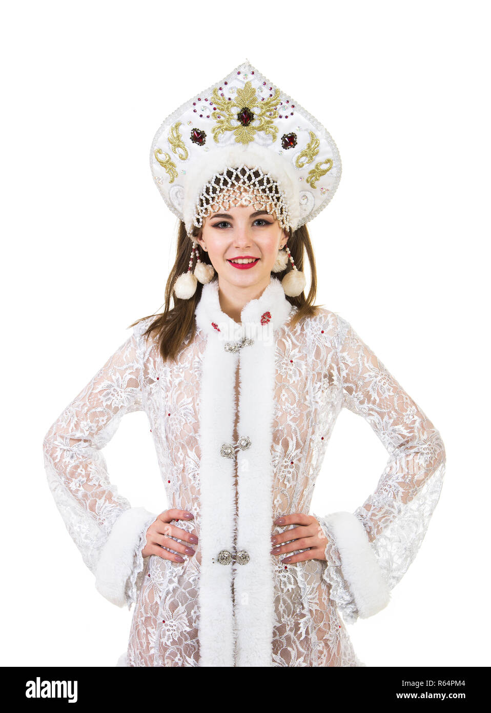 Belle, heureuse, émotionnel jeune femme avec des cheveux longs, habillée comme Santa Claus en souriant. Fêtes du carnaval de l'année. Les images isolées sur zone blanche Banque D'Images