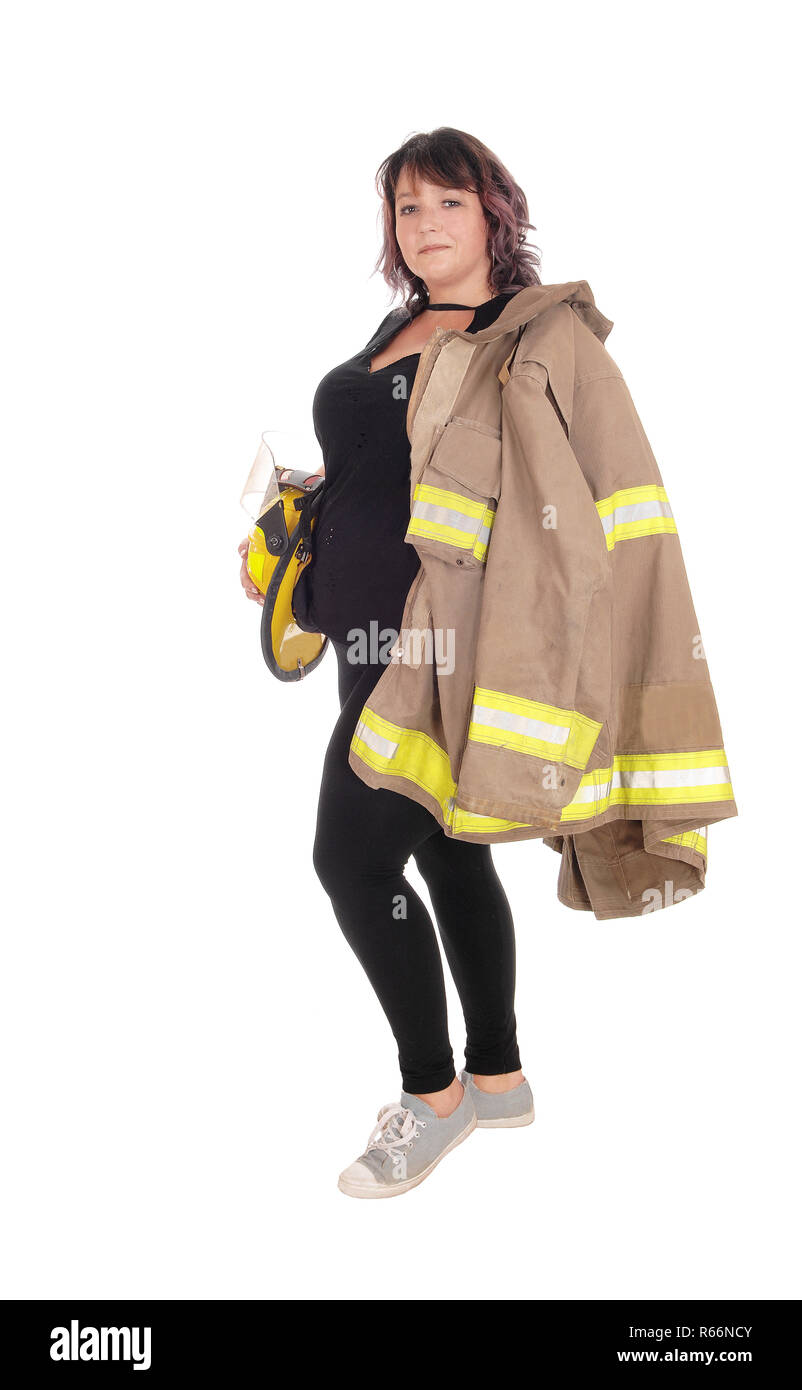 Femme de lutte contre l'incendie à la veste et le casque Banque D'Images