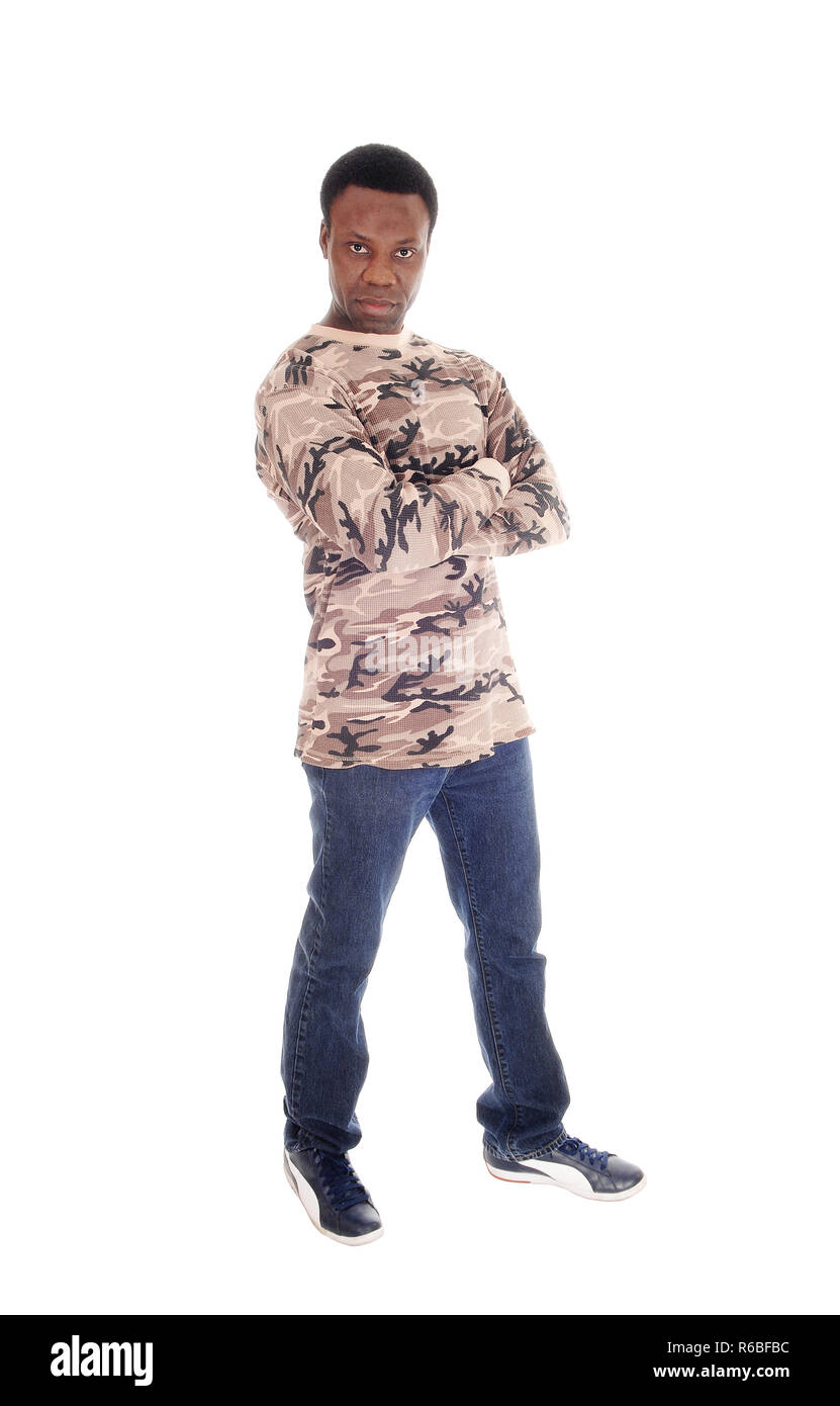 African man standing en jeans et pull-over Banque D'Images