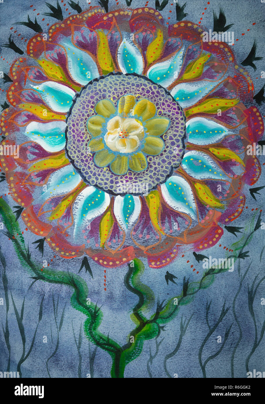 Mandala fleur sur fond bleu. La technique du badigeonnage près des bords donne un effet de flou en raison de la modification de la rugosité de surface du papier. Banque D'Images