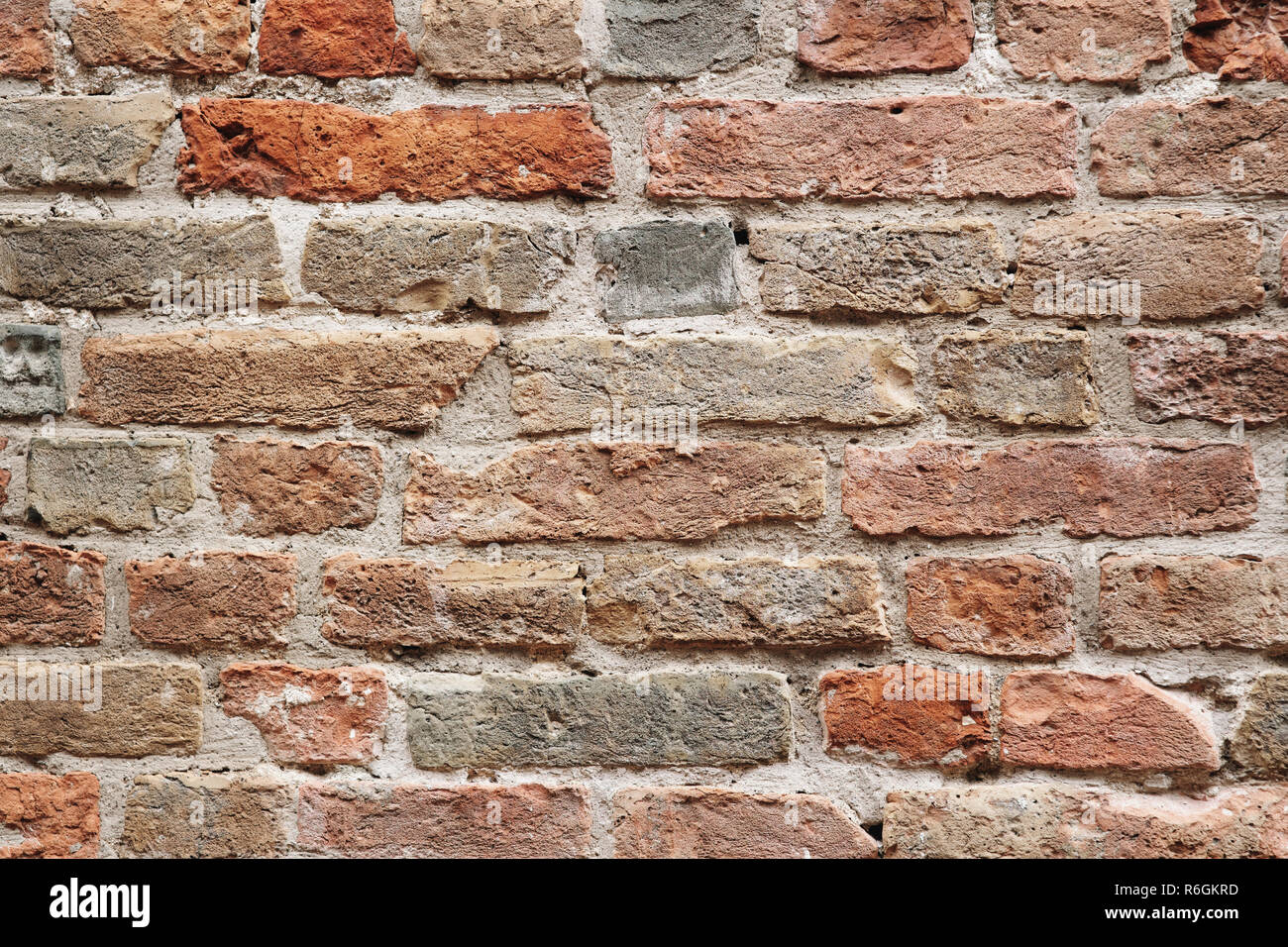 Du vrai vieux mur de briques rouges de l'ancien bâtiment texture background Banque D'Images