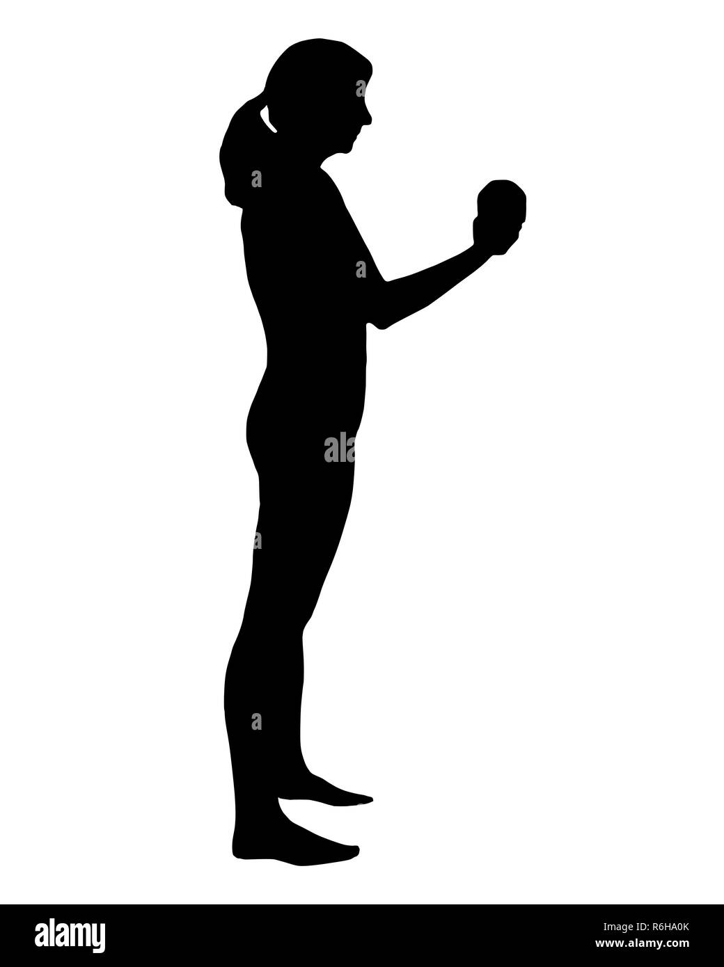 Silhouette d'une femme exerçant Banque D'Images