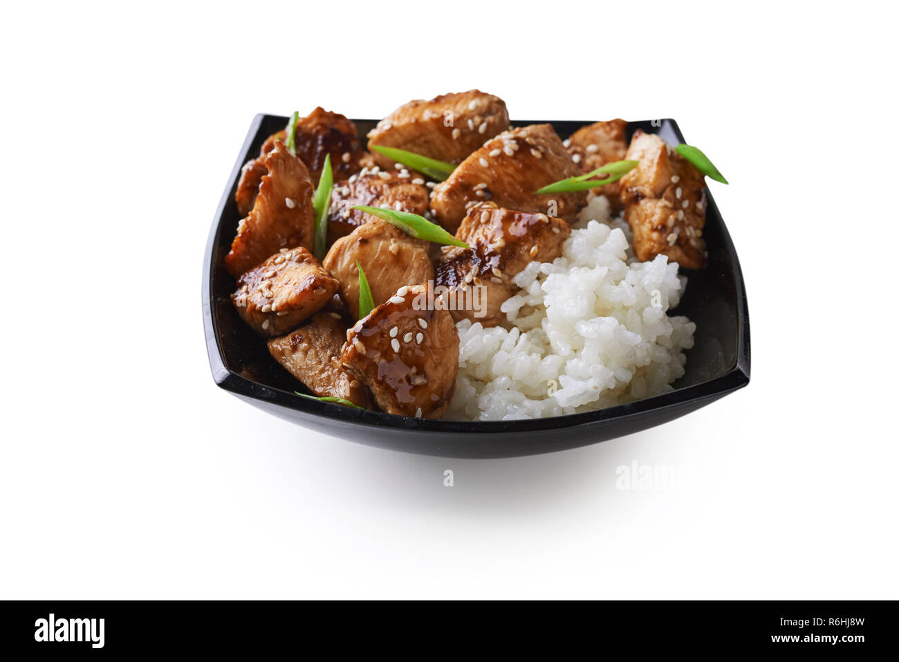 Assiette de poulet teriyaki et riz isolé sur fond blanc Banque D'Images