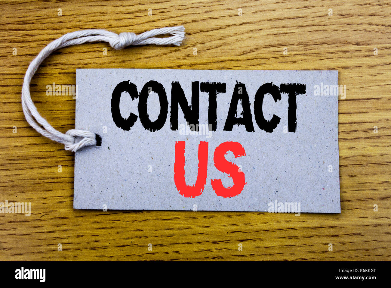 La légende de texte écrit conceptuel montrant Contactez-nous. Concept d'affaires pour le Support Client écrit sur papier d'étiquette de prix avec l'exemplaire de l'espace sur l'arrière-plan vintage en bois Banque D'Images La légende de texte écrit conceptuel montrant Contactez-nous. Concept d'affaires pour le Support Client écrit sur papier d'étiquette de prix avec l'exemplaire de l'espace sur l'arrière-plan vintage en bois Banque D'Images
