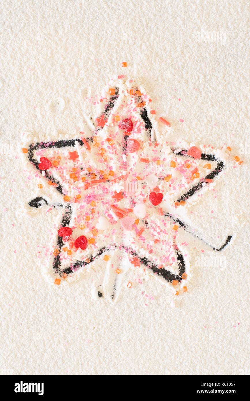 Une étoile de Noël avec sweet saupoudre sur le dessus. Banque D'Images