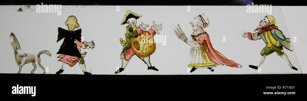 Diapositive peint à la main avec des effets de façon bizarre, slideshelf, papier de verre images slideshare La main glisse sur les bords finis avec du papier blanc-rouge à carreaux. Les images spot semble à la mode de l'époque. Le chien sur la gauche a les cheveux peignés en haut à gauche de l'homme porte un grand arc exagérément dans les cheveux et l'homme à côté d'elle obtient ses mains de très grandes le manchon de la femme et l'homme sur le droit sont plus difficiles à interpréter optics Magic Lantern lanterne magique projet jouet Humour Humour critique Banque D'Images