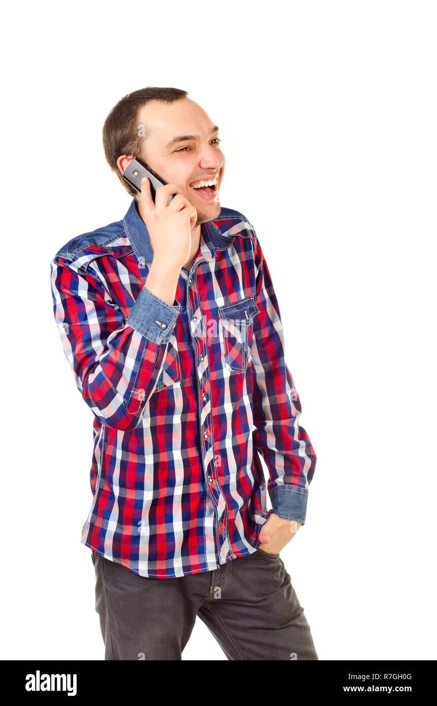 Young man with mobile phone isolated on white Banque D'Images