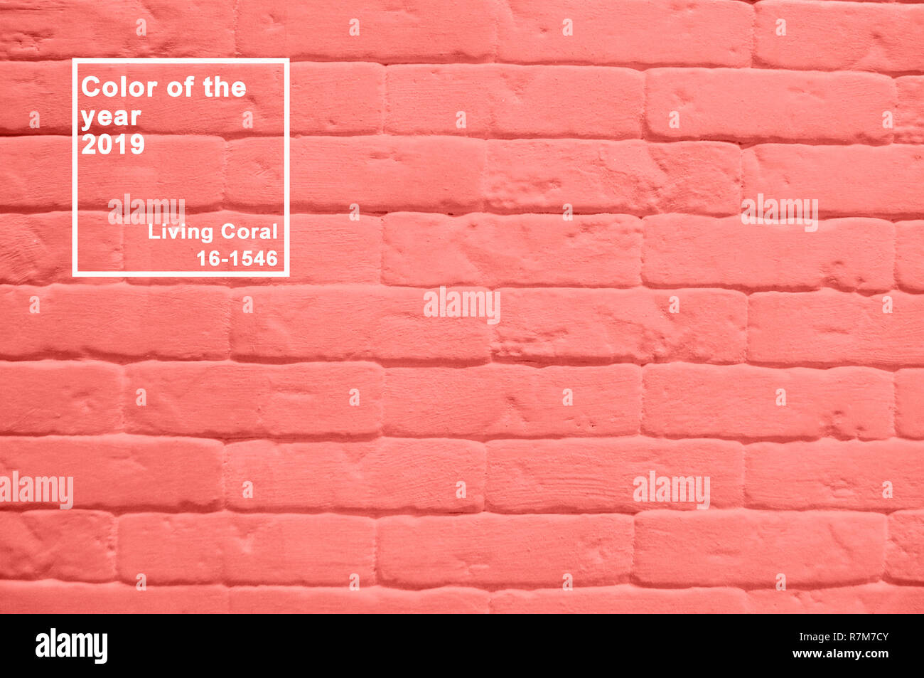 Carreaux de mur en brique corail vivant texture background. Couleur de l'année 2019 concept. Banque D'Images