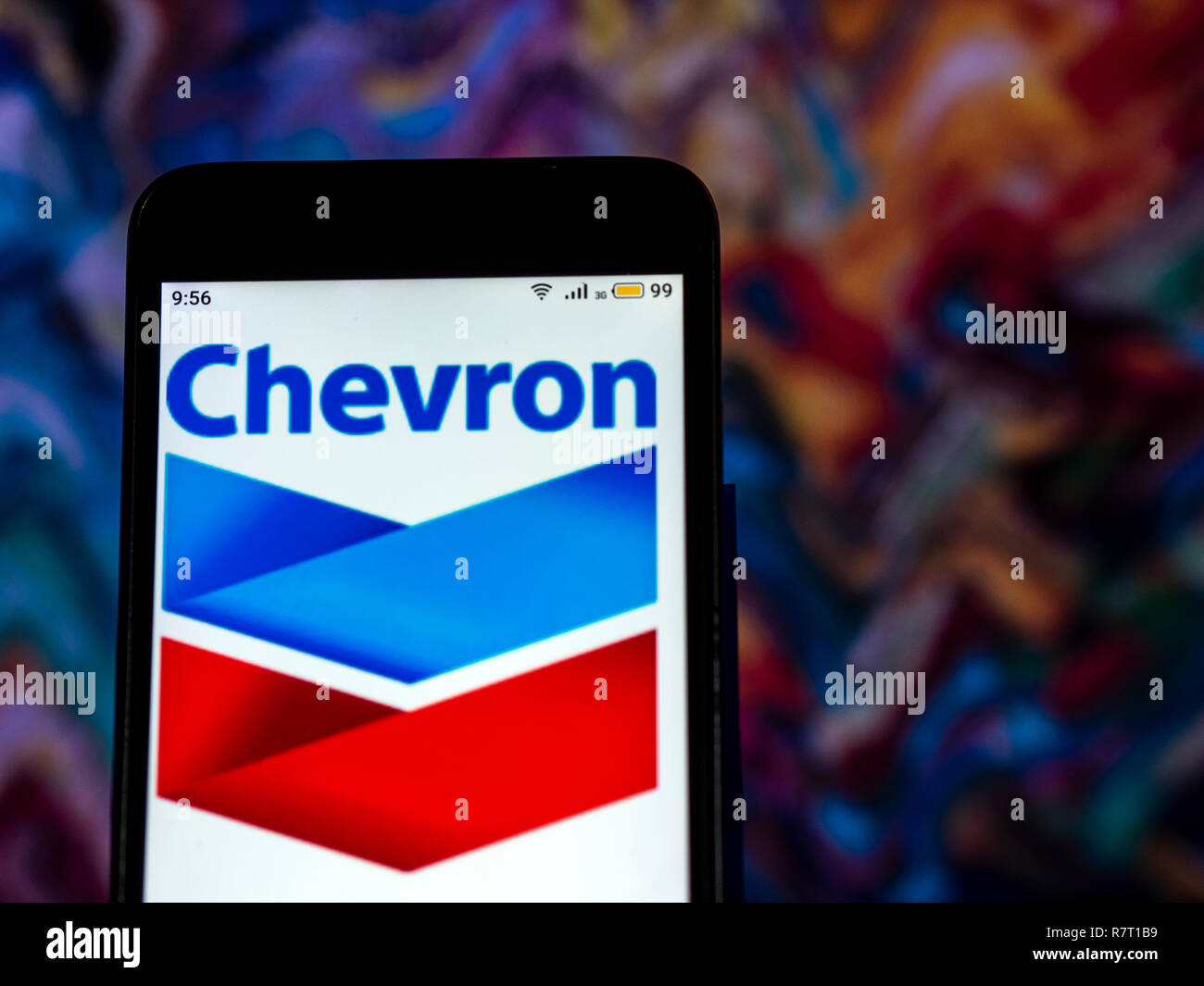 L'industrie pétrolière Chevron Corporation logo de l'entreprise vu affichée sur téléphone intelligent. Banque D'Images