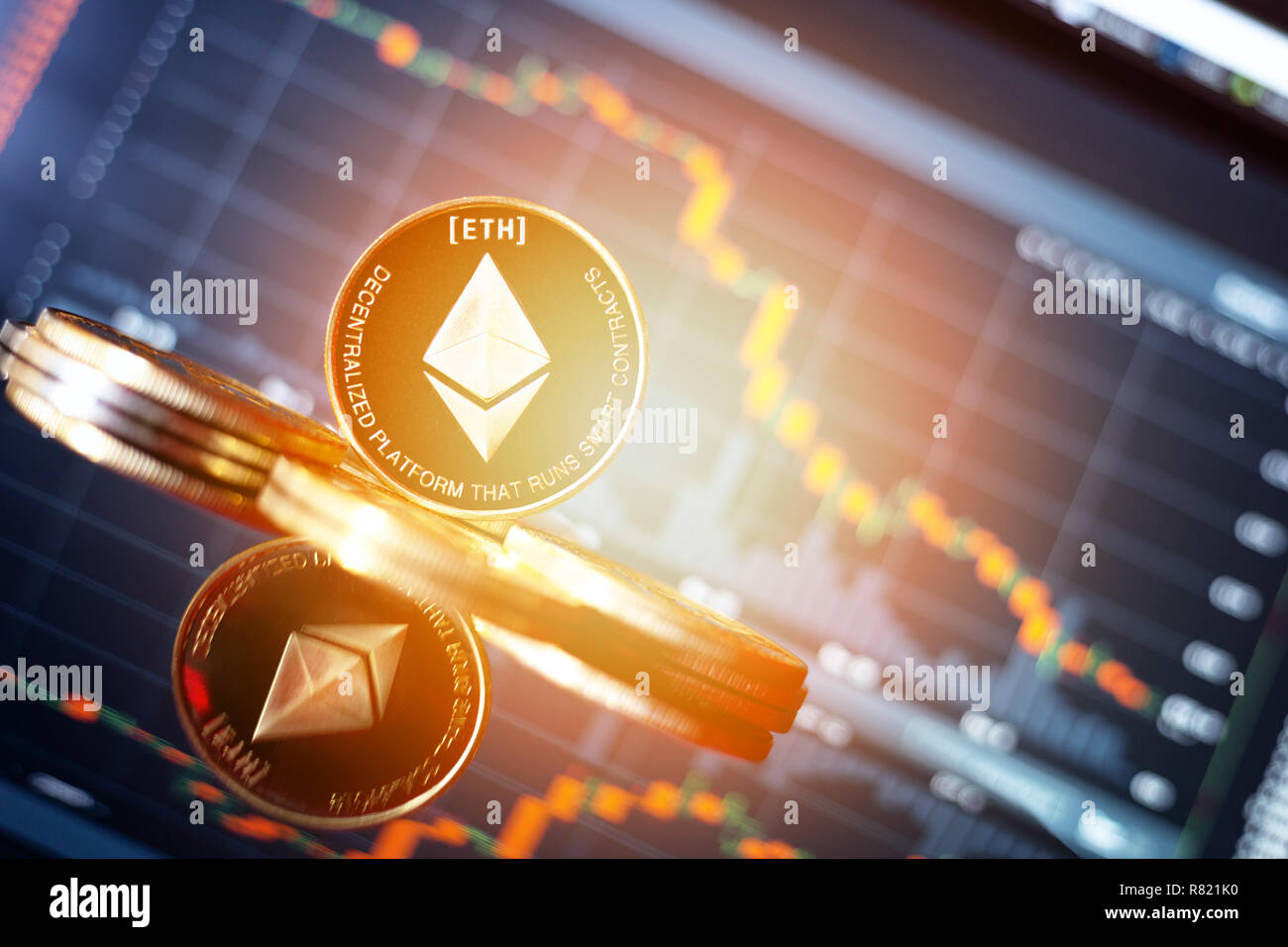 Pièce d'or et de l'échange Ethereum graphin montrant l'arrière-plan de marché boursier Banque D'Images