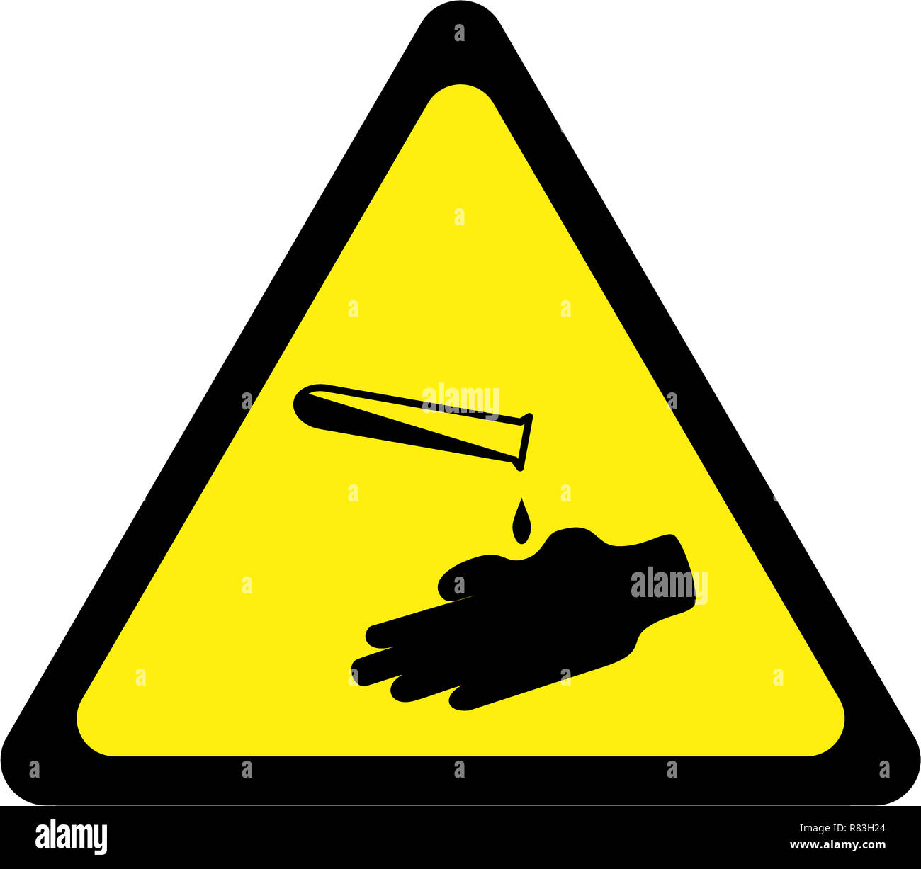 Panneau d'avertissement jaune avec symbole de substances corrosives Banque D'Images