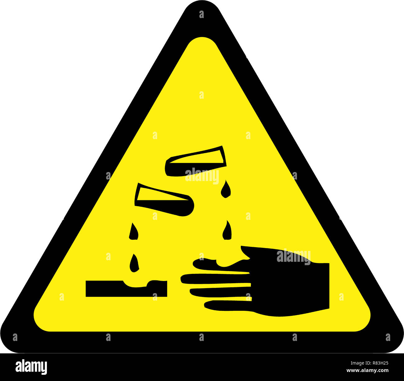 Panneau d'avertissement jaune avec symbole de substances corrosives Banque D'Images