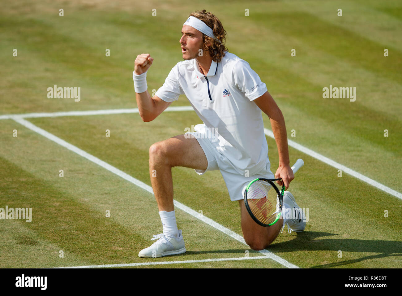 Stefanos Tsitsipas de Grèce en action pendant le tournoi de Wimbledon 2018 Banque D'Images