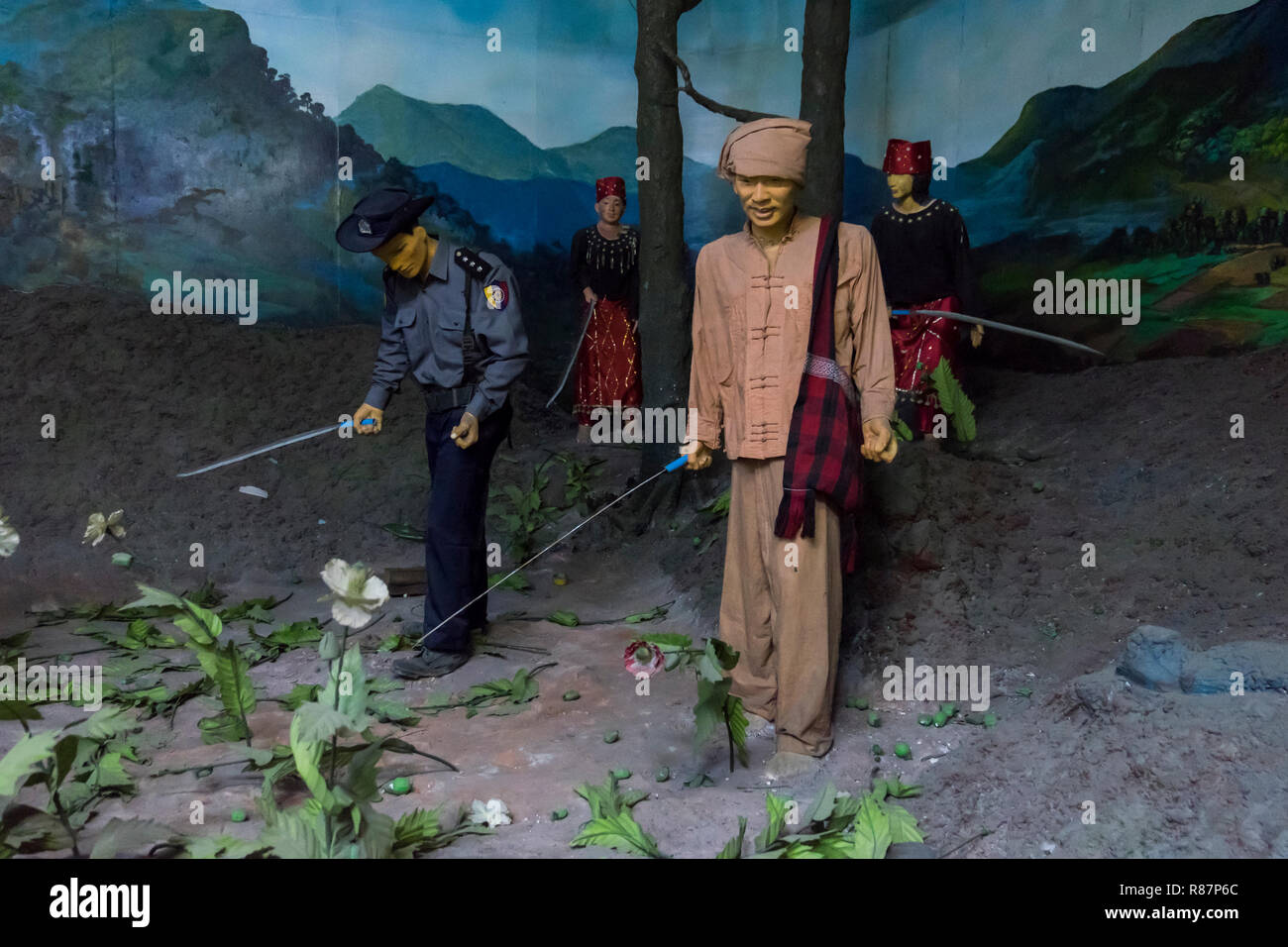 Diorama montrant la destruction du pavot à l'élimination des drogues Museum à Yangon, Myanmar. Banque D'Images