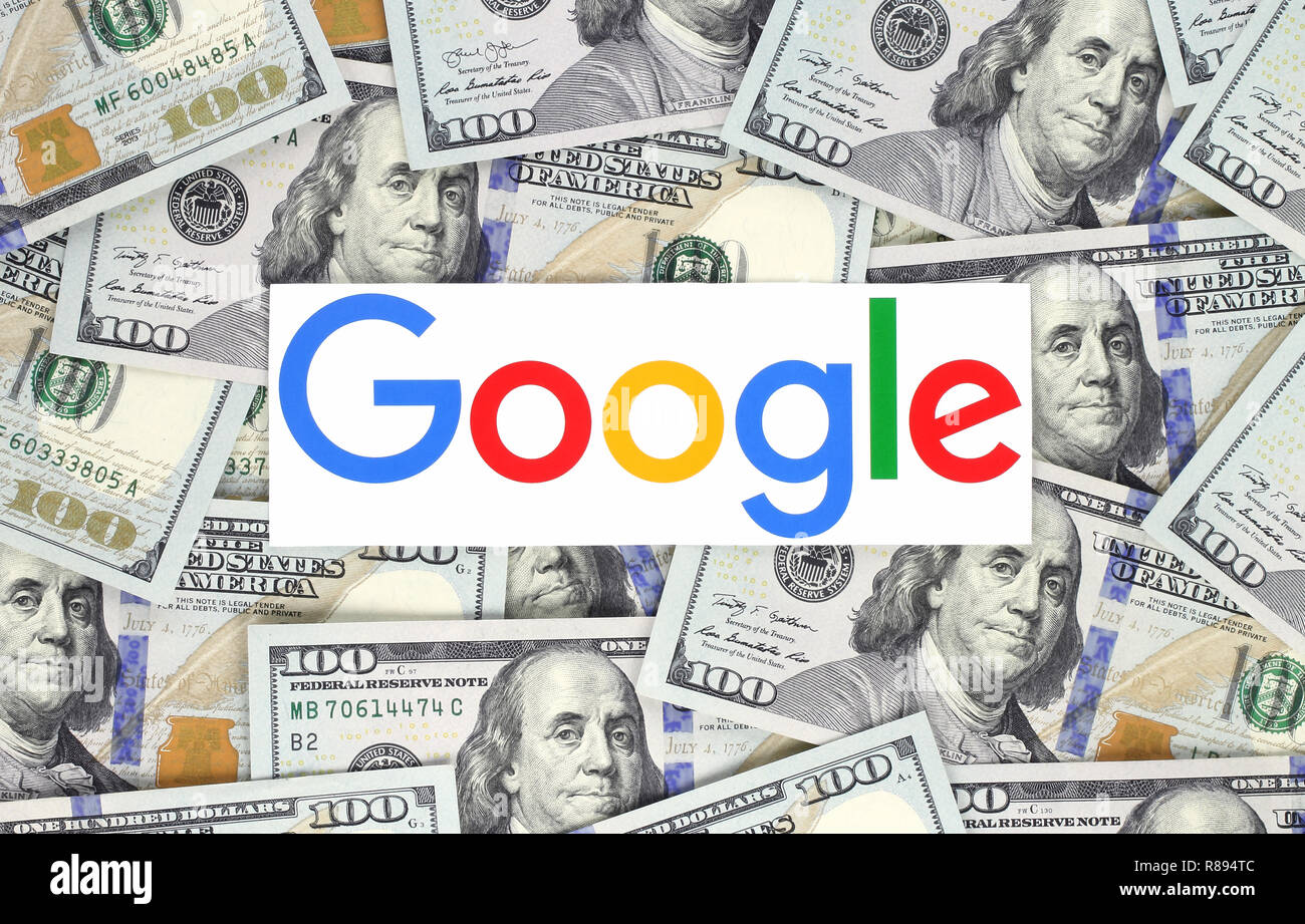 Kiev, Ukraine - 07 septembre 2018 : Google logo imprimé sur papier et mis en contexte de l'argent. Google est une société américaine. Banque D'Images