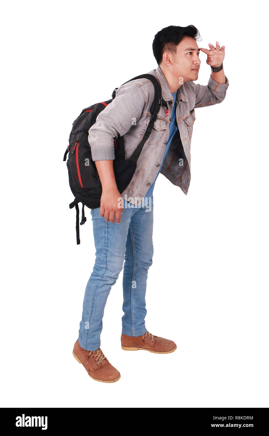 Photo image portrait d'un jeune homme asiatique student standing et à l'avant, vue latérale, isolated on white Banque D'Images