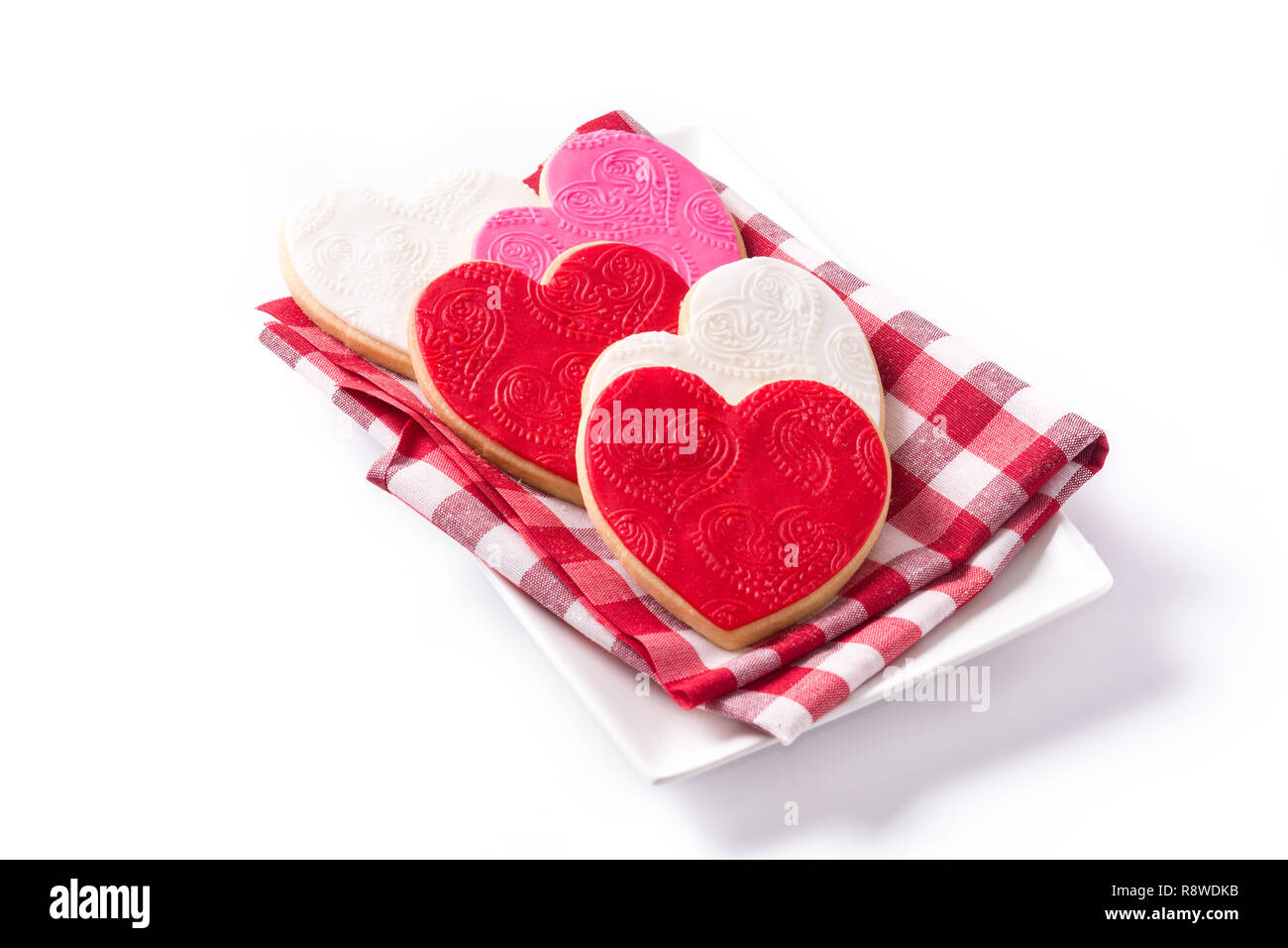 Les cookies en forme de cœur pour la Saint-Valentin isolé sur fond blanc. Banque D'Images