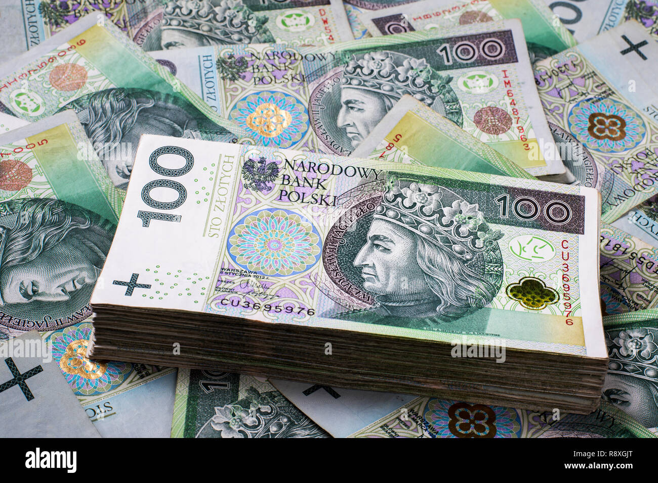 A l'arrière-plan de Polish zloty 100 billets. Texture résumé financier. Banque D'Images