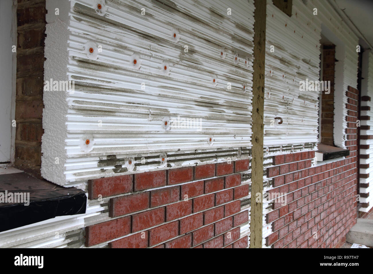 Isolation Mur extérieur Weber à l'aide de bardage en briques Photo Stock -  Alamy