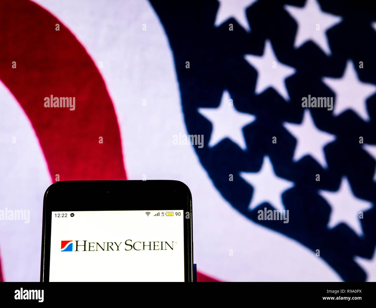 Henry Schein logo de l'entreprise vu affichée sur smart phone Banque D'Images