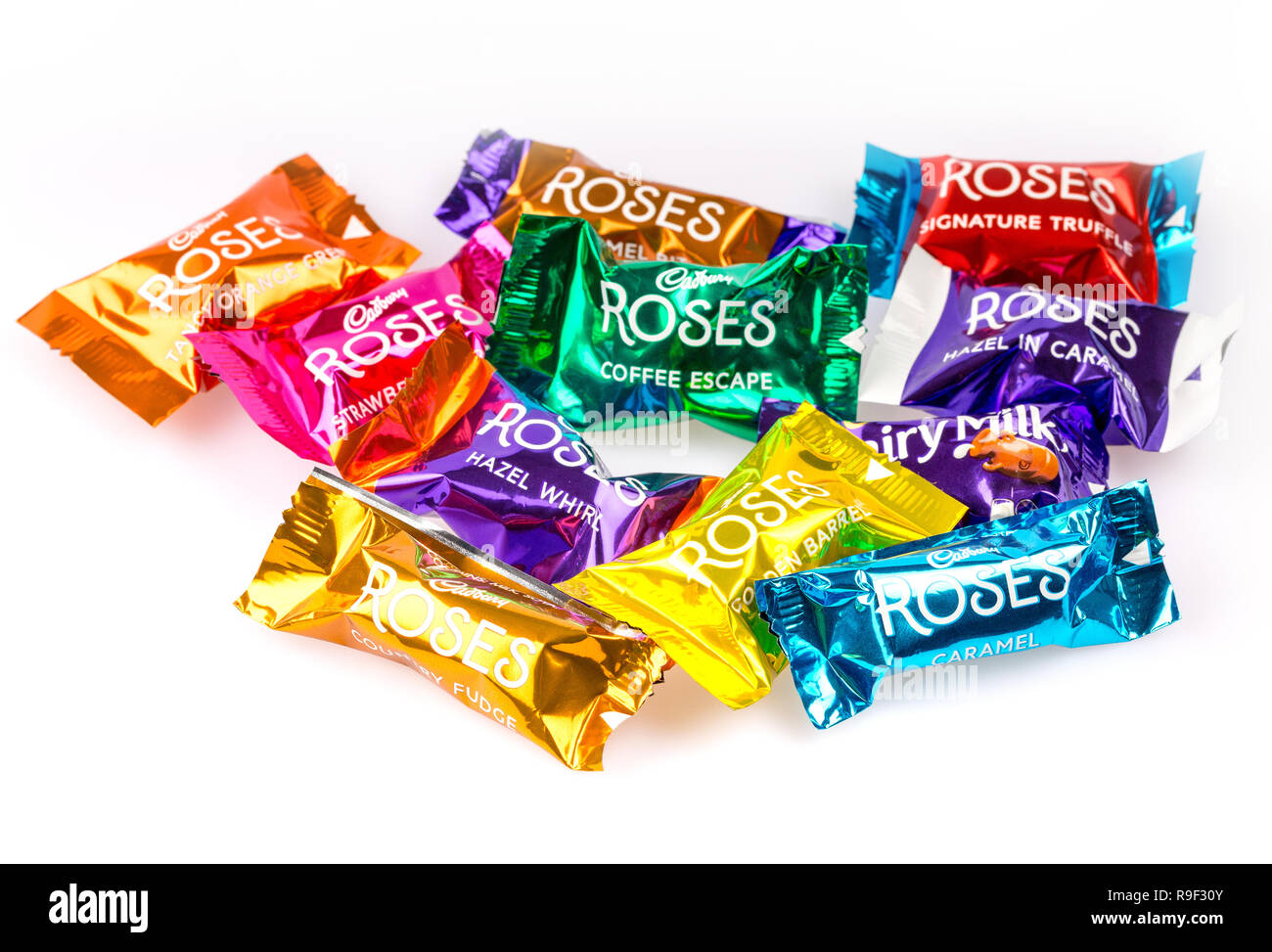 Les chocolats Cadbury roses sur fond blanc Banque D'Images