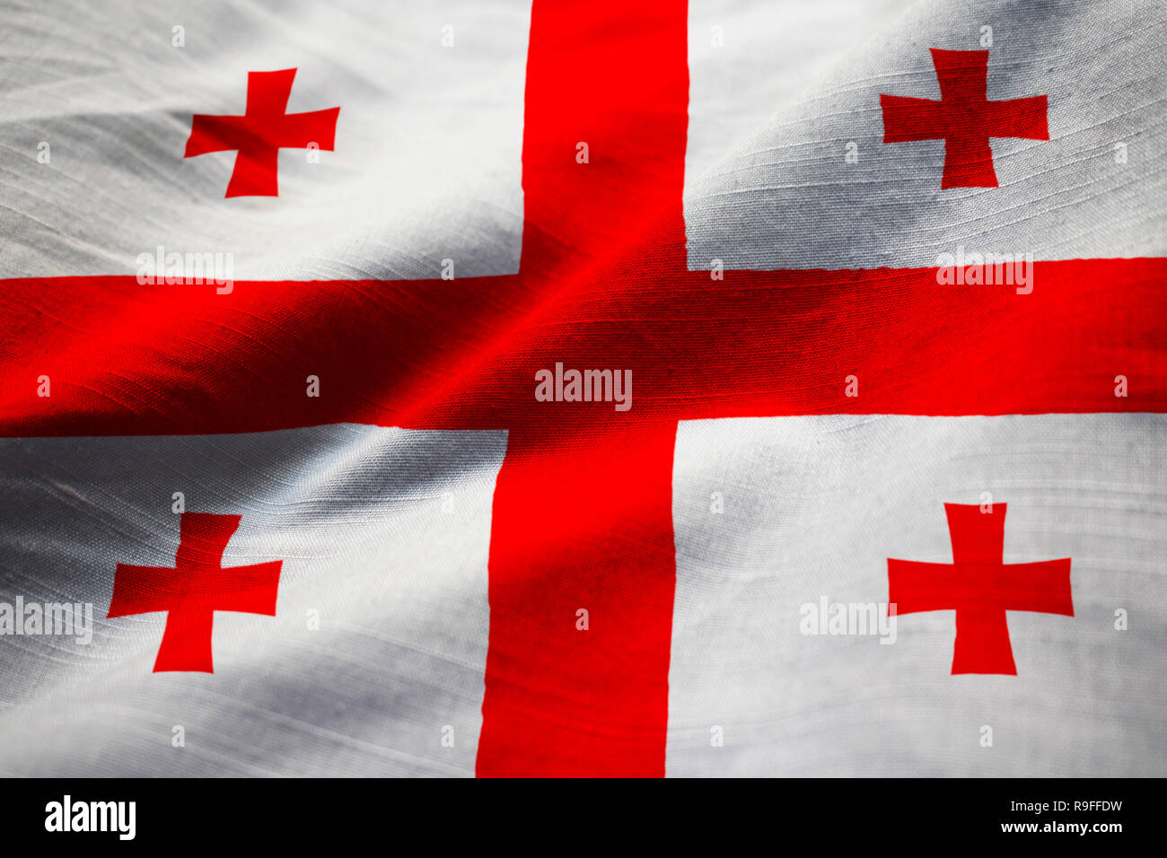 Gros plan du drapeau de la Géorgie La Géorgie, ébouriffé Flag Blowing in Wind Banque D'Images