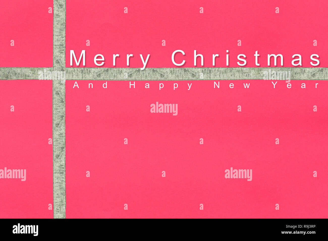 Joyeux Noël texte sur surface rouge papier fond pour la conception dans votre travail. Banque D'Images