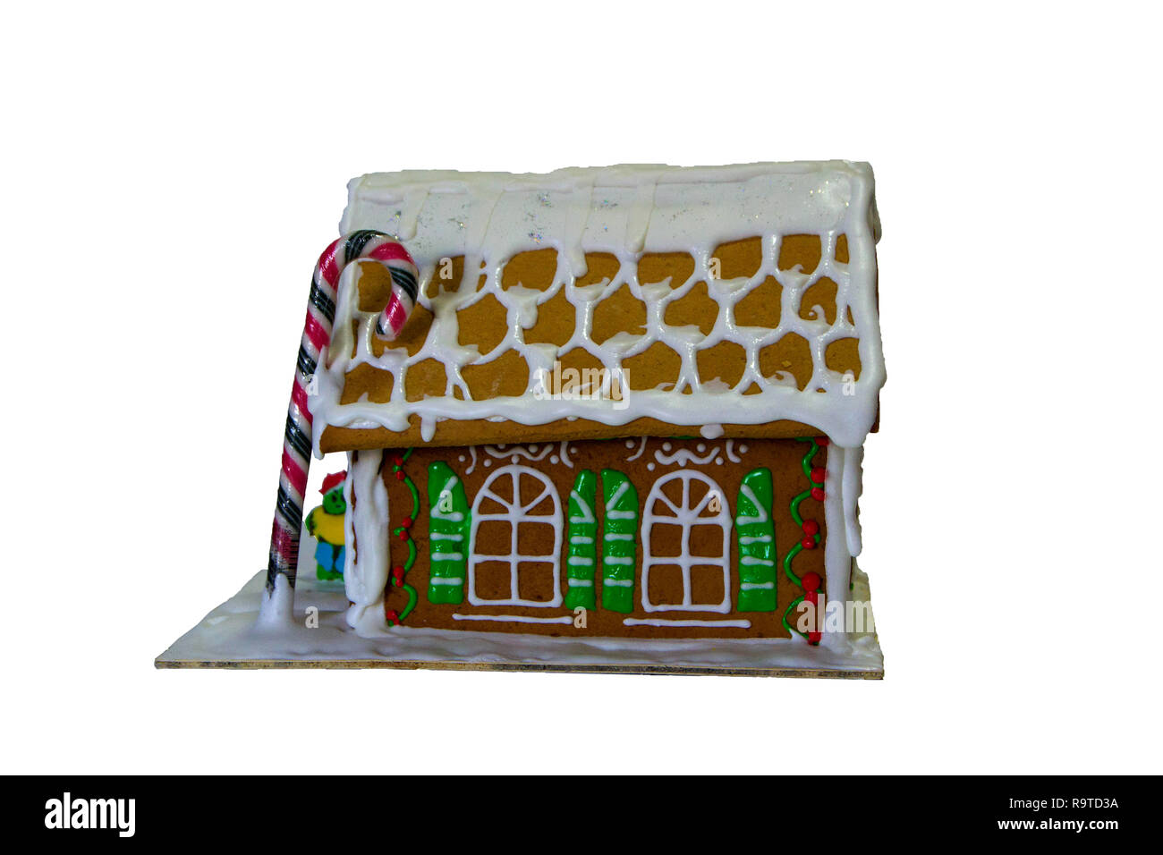 Gingerbread House colorée sur le livre blanc backgrounde. Ambiance de Noël Banque D'Images